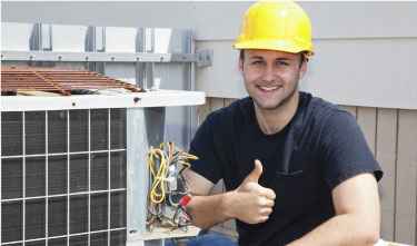 man wearing heard hat on a roof